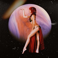 a woman in a red bikini standing in front of a planet